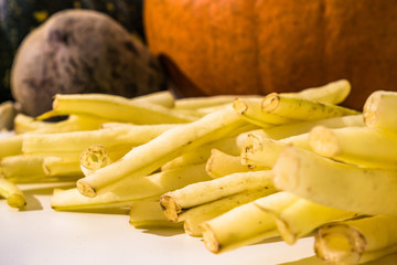 Local autumn vegetables on a white table