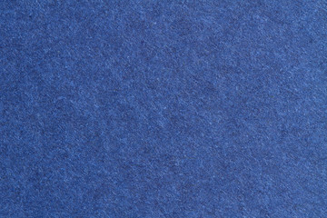Blue paper texture, dark background
