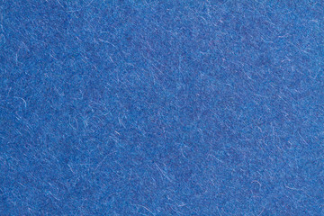 Blue paper texture, dark background