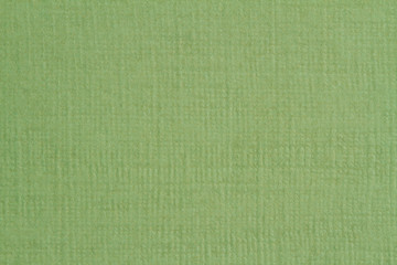 Green paper texture, dark background