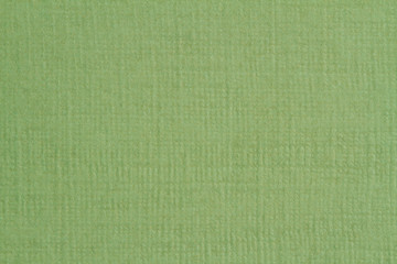Green paper texture, dark background