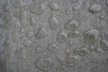 Water droplets on concrete surface - 124735453