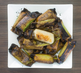 Grilled Sticky rice with taro on white dish