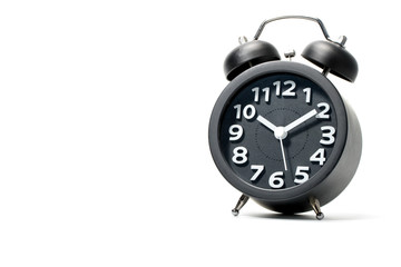 Black alarm clock  on white background