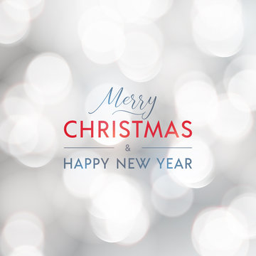 Merry Christmas and Happy New Year greeting card. Typographic vector design, beautiful white bokeh background.