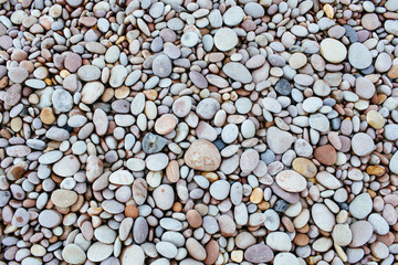 Smooth pebbles of different colors and size.