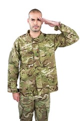 Portrait of confident soldier saluting