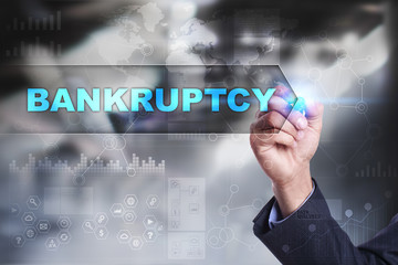 Business is drawing on virtual screen. bankruptcy concept.