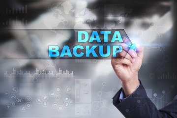 Business is drawing on virtual screen. data backup concept.