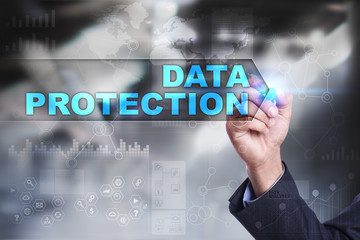 Business is drawing on virtual screen. data protection concept.