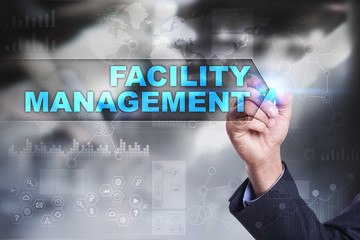 Business is drawing on virtual screen. facility management concept.