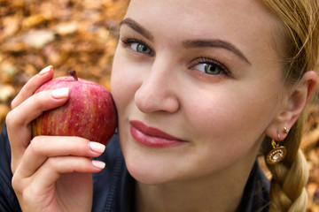  young woman with an apple