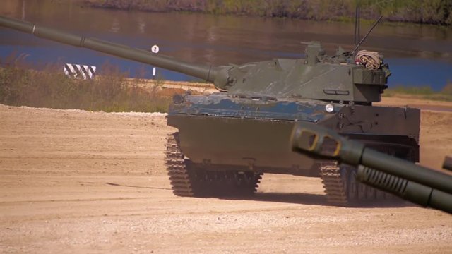 2S25 self-propelled anti-tank gun "Sprut-SD" moving on the range on military exercises. Includes audio. Contains audio