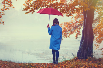 brunette girl with umbrella