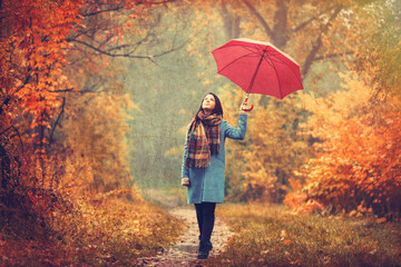 brunette girl with umbrella