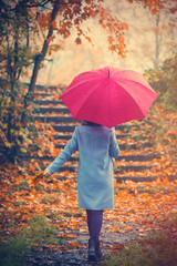 brunette girl with umbrella