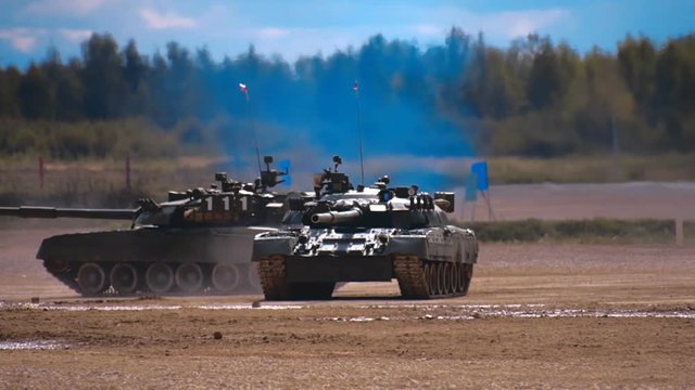 Four tanks T-90 are dancing on "tank biathlon". Includes audio. Contains audio
