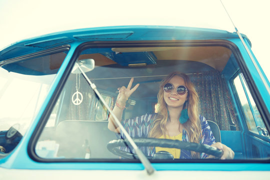 Smiling Young Hippie Woman Driving Minivan Car