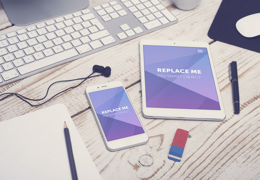 Smartphone and Stationery on Wooden Desk with Headphones 2