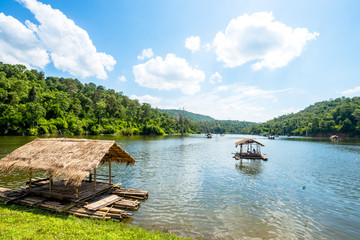 Fototapeta na wymiar Bamboo raft, floating house in lake