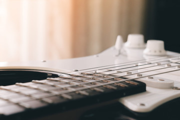 closeup picture of electric rock guitar , film and grunge style