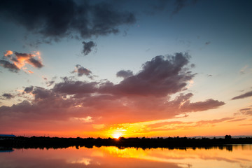 colorful dramatic sky with cloud at sunset