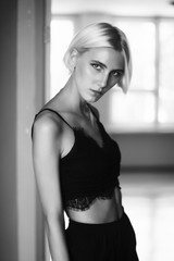 blond woman in black and white