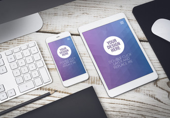 Tablet and Smartphone Close Up on Wooden Desk Mockup 5