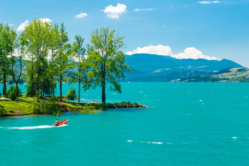 Naklejka na ściany i meble Blue lake on the Durance river in Savines le Lac, France