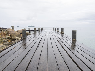 Fototapeta na wymiar wooden jetty on the sea