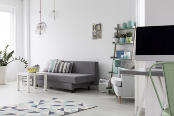 Modern bedroom with bright wooden floor
