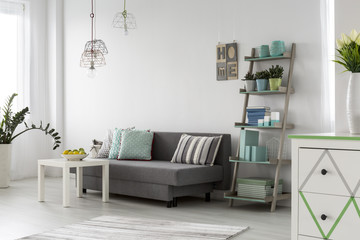 Fototapeta na wymiar Comfortable living room interior with stylish lamps