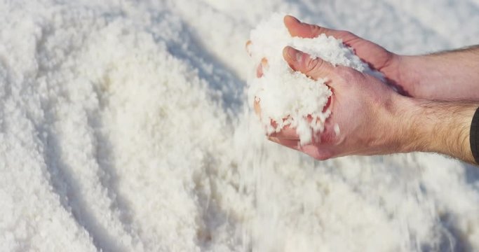 production of industrial salt in the oldest salt mines in the world on a sunny day where the highest quality salt shines