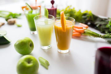 glasses with different fruit or vegetable juices