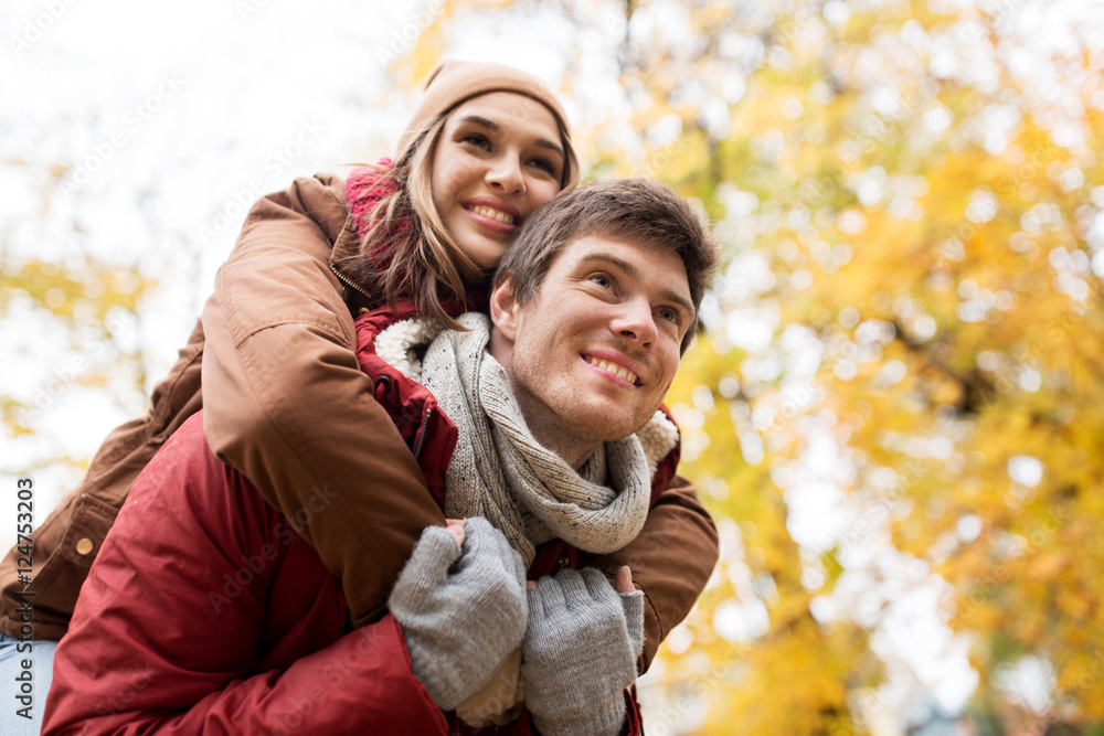 Canvas Prints happy young couple having fun in autumn park