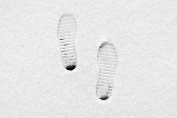 Traces from boots on snow