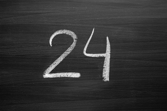 number twenty four enumeration written with a chalk on the blackboard