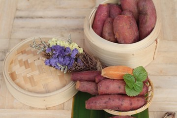 sweet potato boiled is delicious on wood background.