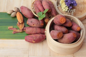 sweet potato boiled is delicious on wood background.