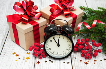 christmas clock on a  wooden background