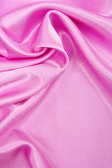 Smooth elegant pink silk as background