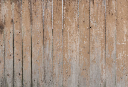 Aged brown wooden fence.