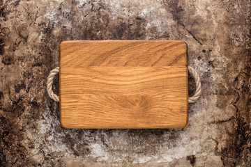Chopping board on rustic table