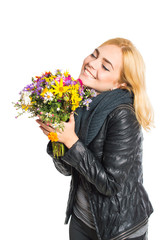 Woman posing with a bouquet. On white, isolated background.