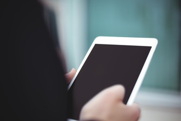 Businesswoman using digital tablet