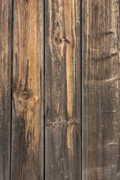 Vertical wooden planks with knothole - texture or background