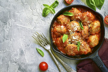 Meatballs in tomato sauce in a skillet.Top view.