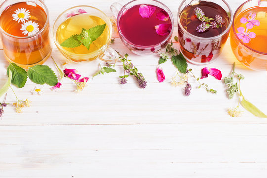 herbal tea on a white wooden background