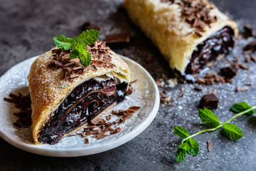 Strudel stuffed with chocolate and cherry filling