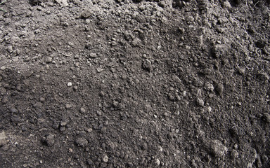 Black ground textured ground.